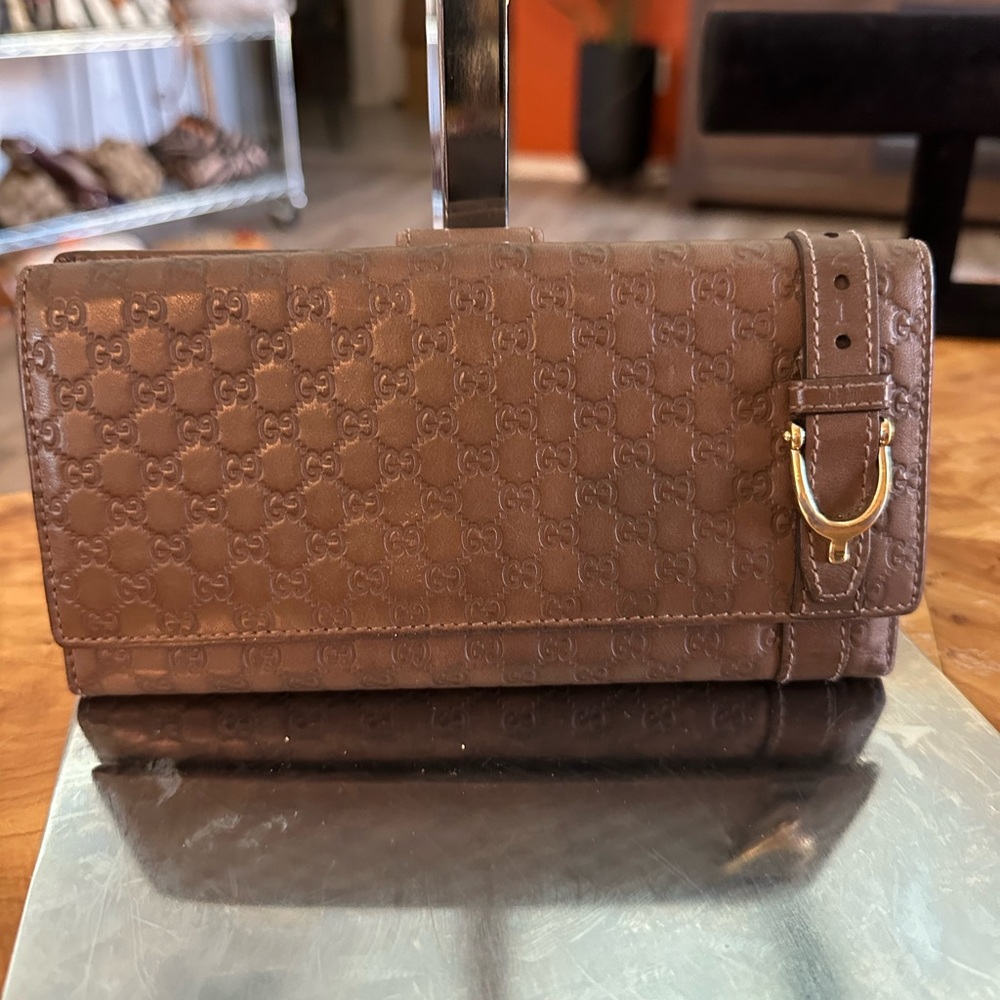 Gucci Guccissima  Brown Embossed Signature Leather Clutch with Gold Buckle